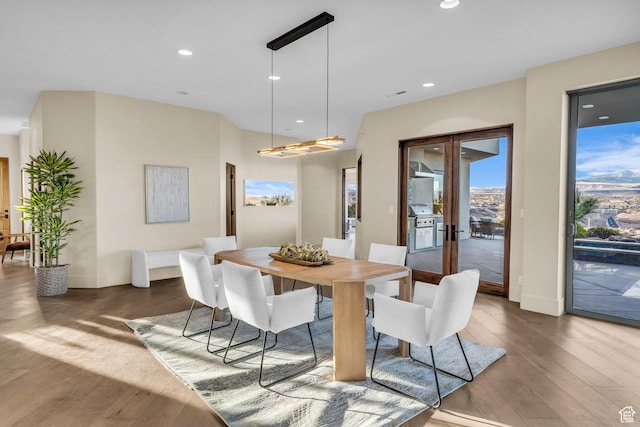 2031 E Cliff Point Dr, St George, UT 84790 - dining room featuring recessed lighting, french doors, and wood finished floors