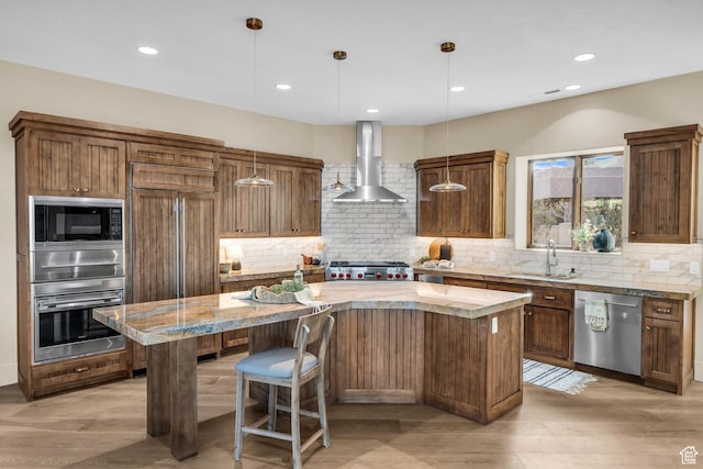 2031 E Cliff Point Dr, St George, UT 84790 - kitchen with wall chimney range hood, a center island with sink, stainless steel dishwasher, stove, and a sink