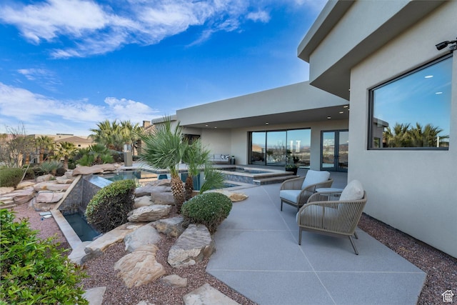 2031 E Cliff Point Dr, St George, UT 84790 - view of patio with a pool with connected hot tub