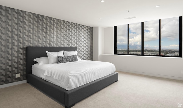 48 W 300 S Unit 2204-N, Salt Lake City, UT 84101 - carpeted bedroom featuring visible vents, baseboards, wallpapered walls, recessed lighting, and an accent wall