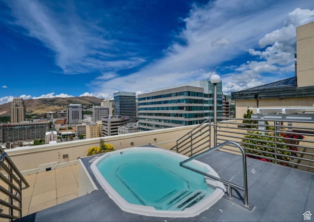 48 W 300 S Unit 2204-N, Salt Lake City, UT 84101 - view of swimming pool featuring a mountain view and a view of city