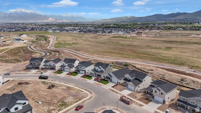 6311 W Butte County Dr S Unit 448, Herriman, UT 84096 - aerial view of residential area featuring a mountain backdrop