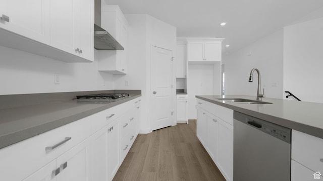 6311 W Butte County Dr S Unit 448, Herriman, UT 84096 - kitchen featuring stainless steel appliances, a sink, wood finished floors, recessed lighting, and white cabinets