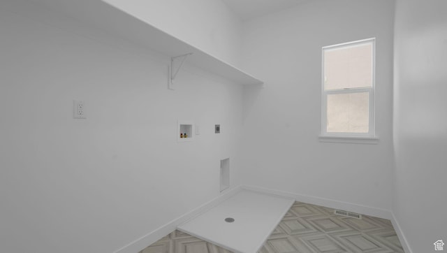 6311 W Butte County Dr S Unit 448, Herriman, UT 84096 - laundry room featuring hookup for a washing machine, baseboards, and hookup for an electric dryer