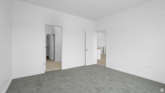 6311 W Butte County Dr S Unit 448, Herriman, UT 84096 - unfurnished bedroom with carpet and baseboards