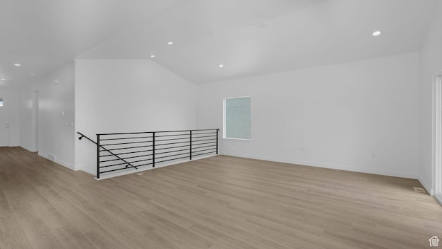 6311 W Butte County Dr S Unit 448, Herriman, UT 84096 - bonus room featuring light wood-style floors, baseboards, recessed lighting, and lofted ceiling