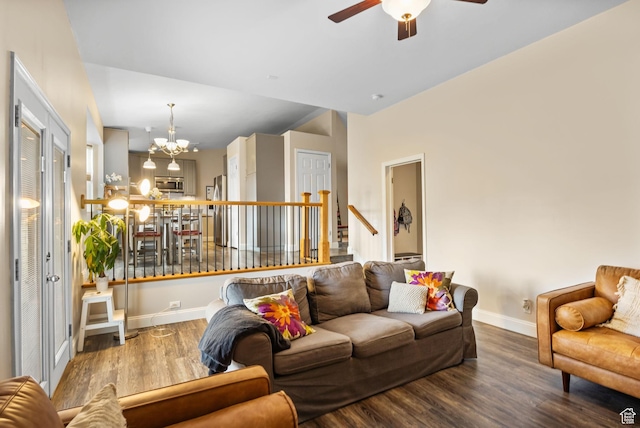 13105 S 2420 W, Riverton, UT 84065 - living room with wood finished floors, ceiling fan, baseboards, a chandelier, and stairway