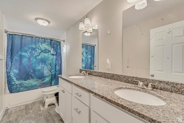 77 E 1100 N, Pleasant Grove, UT 84062 - full bath featuring double vanity, wood finished floors, toilet, and a sink