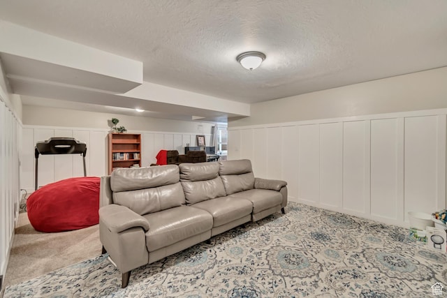 77 E 1100 N, Pleasant Grove, UT 84062 - carpeted living area featuring a wainscoted wall and a textured ceiling