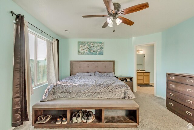 932 Jasper Cir, Tooele, UT 84074 - bedroom featuring carpet flooring, baseboards, ensuite bathroom, and ceiling fan