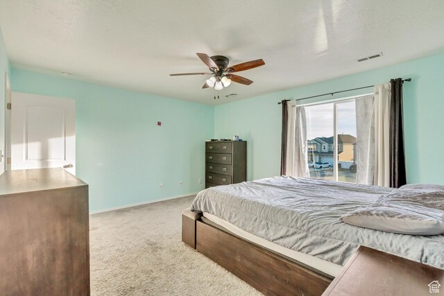 932 Jasper Cir, Tooele, UT 84074 - carpeted bedroom featuring a ceiling fan, baseboards, and visible vents