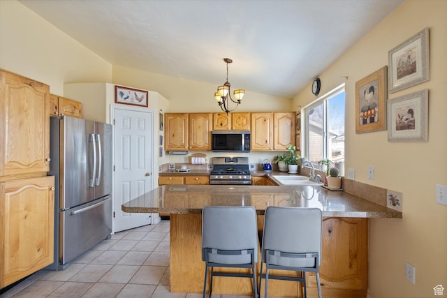 5965 S Stone Flower Way, Salt Lake City, UT 84118 - kitchen with vaulted ceiling, a peninsula, light tile patterned flooring, stainless steel appliances, and a sink