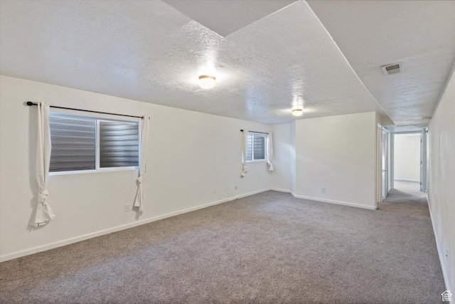 5965 S Stone Flower Way, Salt Lake City, UT 84118 - carpeted spare room featuring visible vents, baseboards, and a textured ceiling
