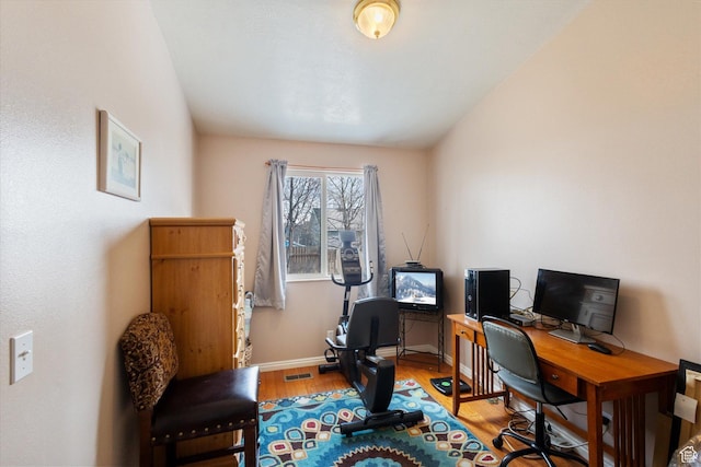 5965 S Stone Flower Way, Salt Lake City, UT 84118 - office with visible vents, baseboards, and wood finished floors