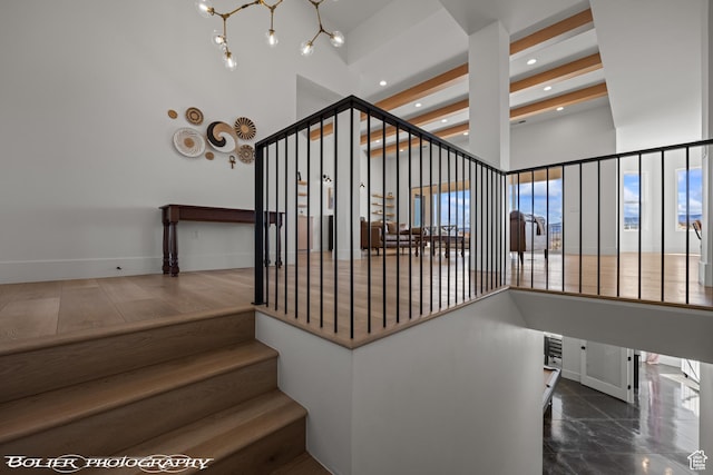 3218 E Rimrunner Dr, St George, UT 84790 - stairway featuring recessed lighting, baseboards, and a towering ceiling