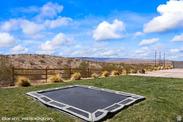 3218 E Rimrunner Dr, St George, UT 84790 - view of yard with fence and a mountain view