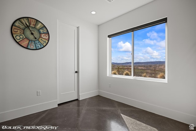 3218 E Rimrunner Dr, St George, UT 84790 - empty room with recessed lighting, baseboards, and finished concrete flooring