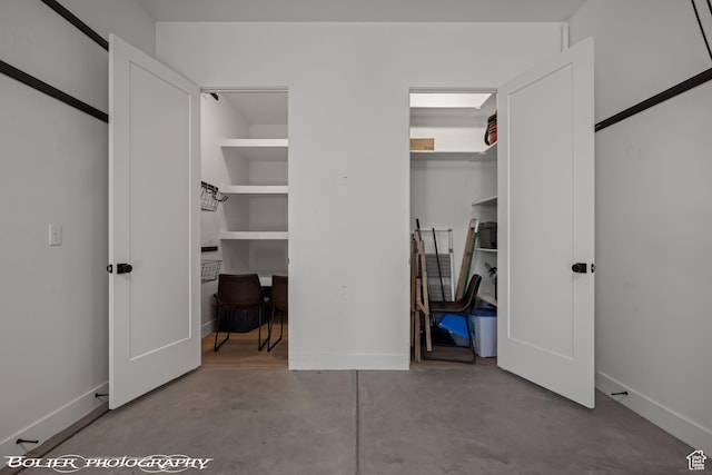 3218 E Rimrunner Dr, St George, UT 84790 - unfurnished bedroom featuring concrete floors and baseboards