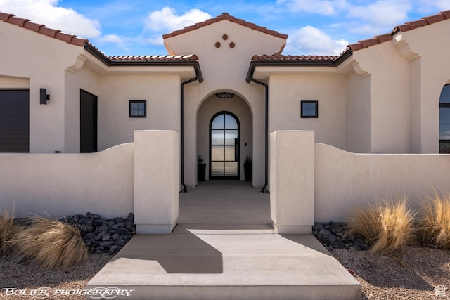 3218 E Rimrunner Dr, St George, UT 84790 - entrance to property with a tiled roof and stucco siding