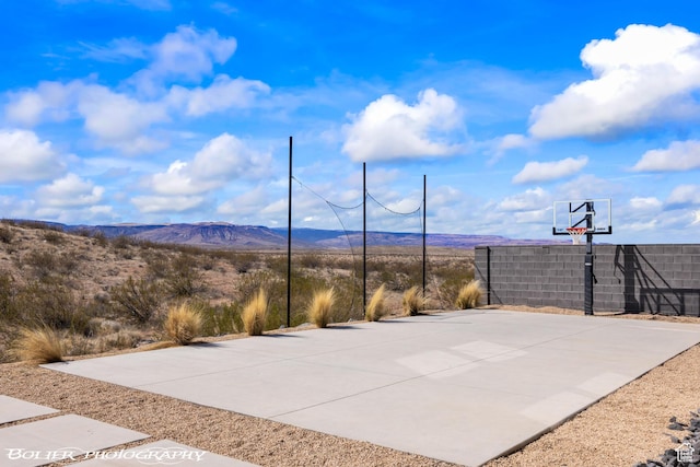 3218 E Rimrunner Dr, St George, UT 84790 - view of sport court with a mountain view and basketball court