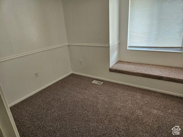 5063 S 2825 W, Roy, UT 84067 - carpeted empty room with baseboards and visible vents