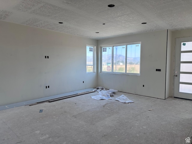 265 W 400 S, Ephraim, UT 84627 - unfurnished living room with a textured ceiling