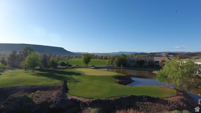 view of home's community with a water and mountain view