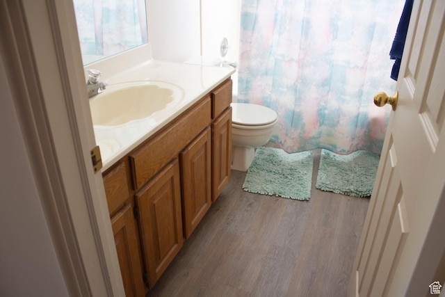 246 W 5000 S, Washington Terrace, UT 84405 - bathroom with vanity, curtained shower, toilet, and wood finished floors