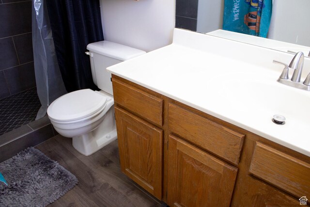 246 W 5000 S, Washington Terrace, UT 84405 - full bath with vanity, toilet, wood finished floors, and a stall shower