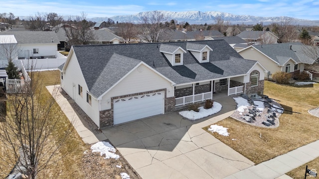 bird's eye view with a mountain view and a residential view