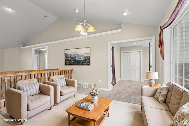 living area featuring visible vents, baseboards, vaulted ceiling, light carpet, and a notable chandelier