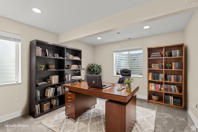 office space featuring light carpet, recessed lighting, and baseboards