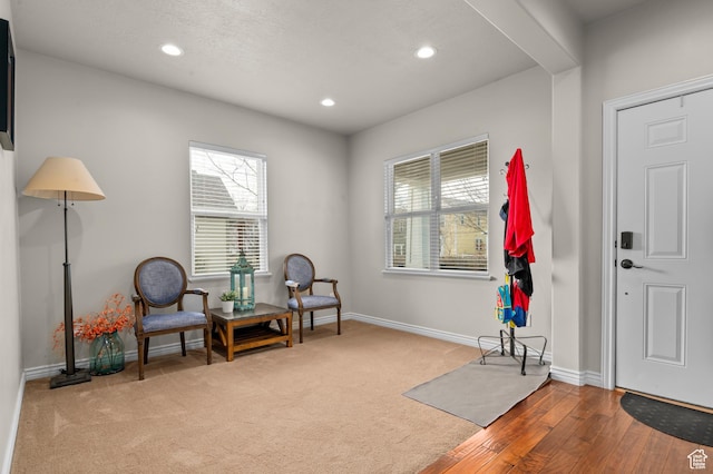 11709 S Grandville Ave, South Jordan, UT 84009 - sitting room featuring healthy amount of natural light, recessed lighting, and wood finished floors