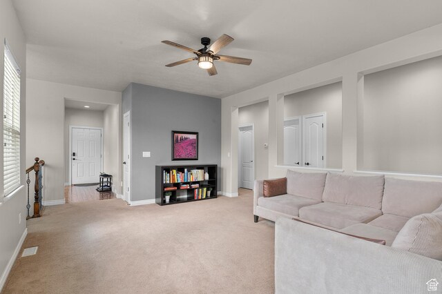 11709 S Grandville Ave, South Jordan, UT 84009 - living room featuring ceiling fan and light colored carpet