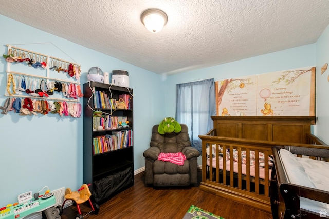 2348 Iowa Ave, Ogden, UT 84401 - bedroom featuring wood finished floors and a textured ceiling