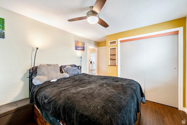 2348 Iowa Ave, Ogden, UT 84401 - bedroom featuring a ceiling fan, wood finished floors, and a textured ceiling