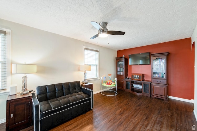 2348 Iowa Ave, Ogden, UT 84401 - living room with ceiling fan, baseboards, a textured ceiling, and dark wood finished floors