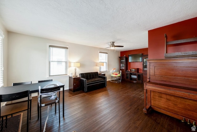 2348 Iowa Ave, Ogden, UT 84401 - dining area with baseboards, a textured ceiling, ceiling fan, and dark wood-style flooring