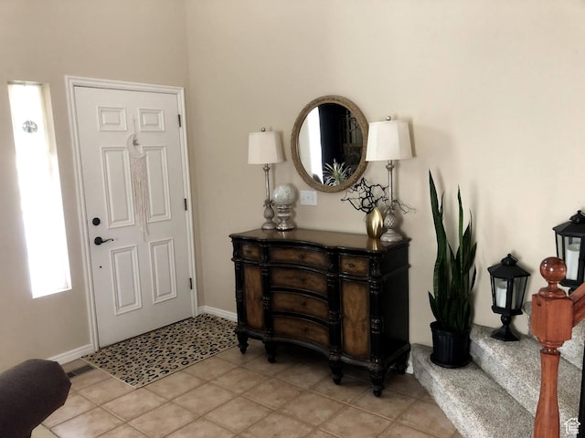8377 S Wild Oak Dr, West Jordan, UT 84088 - foyer entrance featuring baseboards and light tile patterned flooring