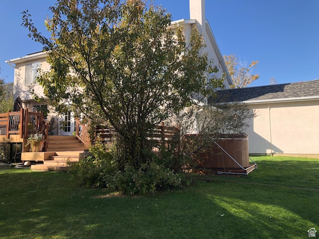 8377 S Wild Oak Dr, West Jordan, UT 84088 - exterior space featuring a yard, a deck, and stucco siding
