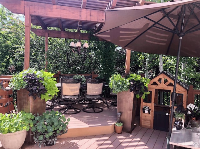 8377 S Wild Oak Dr, West Jordan, UT 84088 - wooden terrace featuring outdoor dining space and a pergola