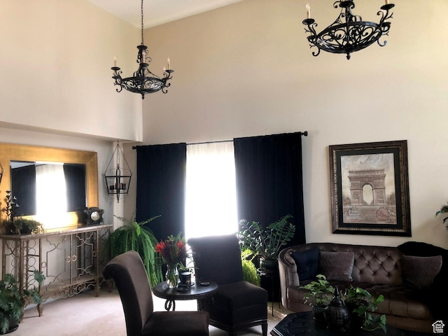 8377 S Wild Oak Dr, West Jordan, UT 84088 - dining room with a chandelier, a healthy amount of sunlight, a high ceiling, and carpet