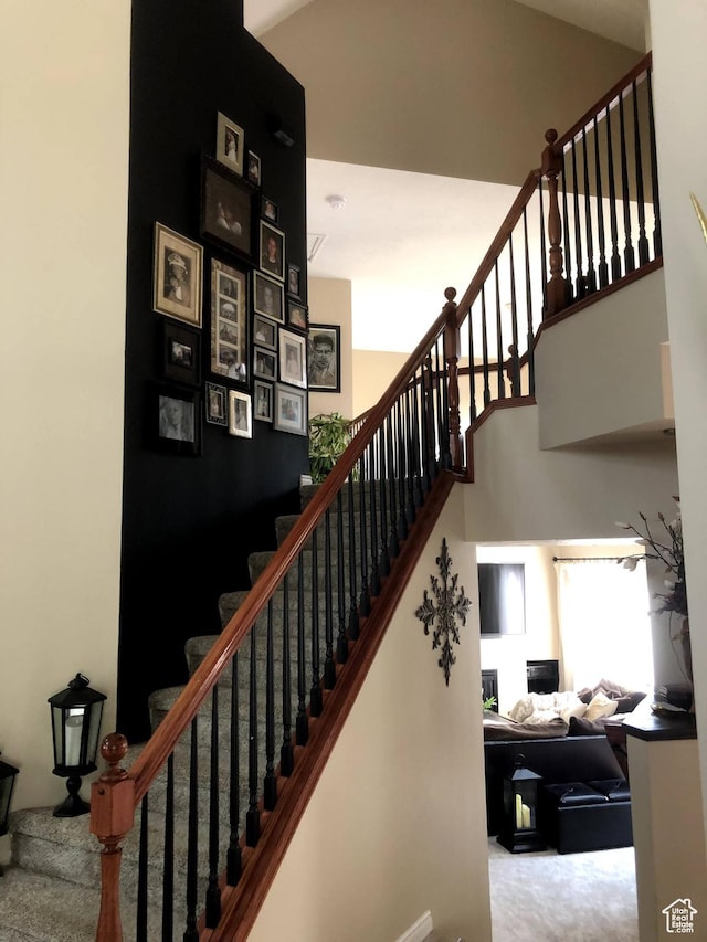 8377 S Wild Oak Dr, West Jordan, UT 84088 - stairs featuring a towering ceiling