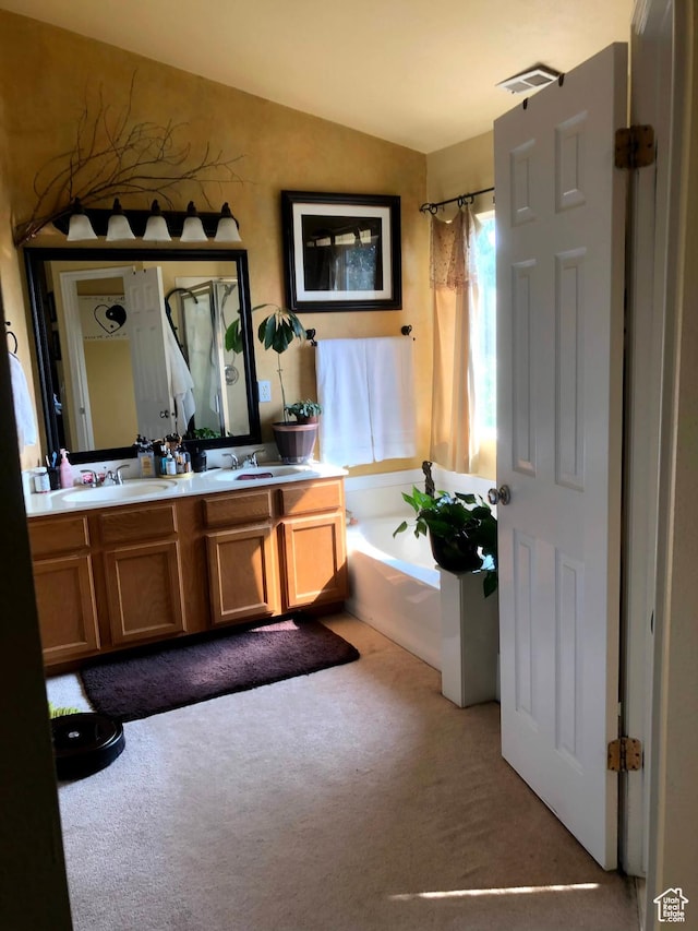 8377 S Wild Oak Dr, West Jordan, UT 84088 - full bathroom featuring a shower with curtain, a sink, a bathing tub, double vanity, and lofted ceiling