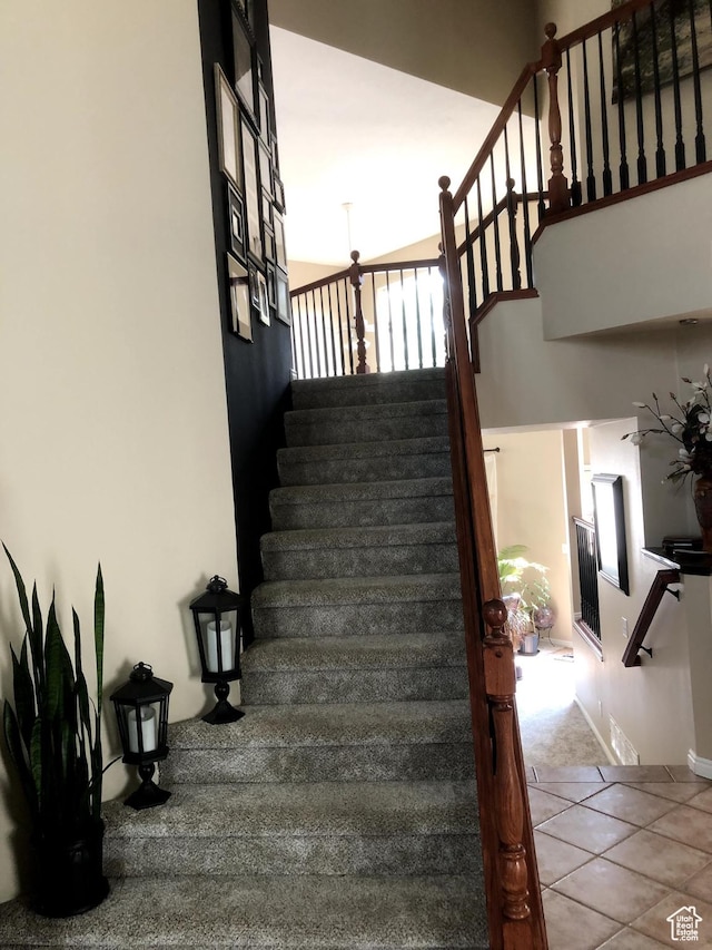 8377 S Wild Oak Dr, West Jordan, UT 84088 - stairs featuring tile patterned flooring