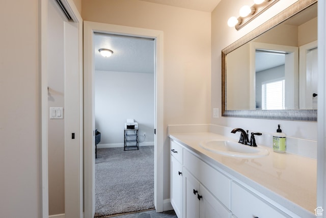 3084 W 1750 N Unit 1, Cedar City, UT 84721 - bathroom with baseboards and vanity