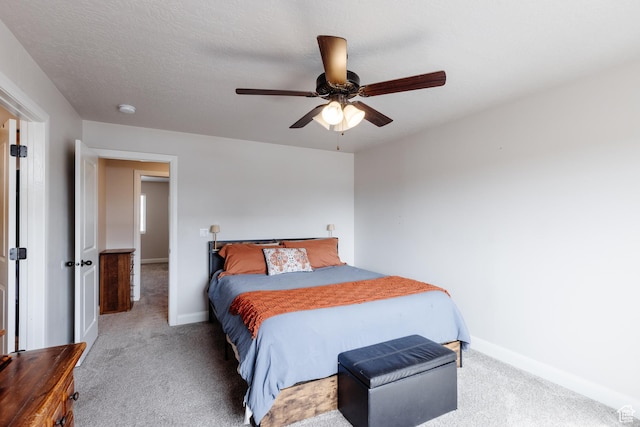 3084 W 1750 N Unit 1, Cedar City, UT 84721 - bedroom with baseboards, a ceiling fan, carpet flooring, and a textured ceiling