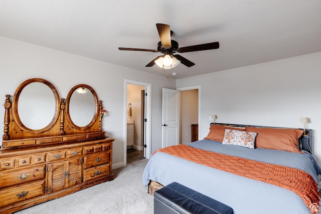 3084 W 1750 N Unit 1, Cedar City, UT 84721 - bedroom featuring baseboards, light colored carpet, connected bathroom, and a ceiling fan