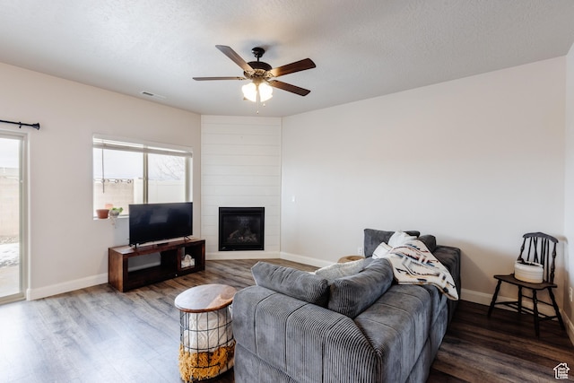 3084 W 1750 N Unit 1, Cedar City, UT 84721 - living room with visible vents, baseboards, ceiling fan, and wood finished floors