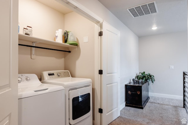 3084 W 1750 N Unit 1, Cedar City, UT 84721 - laundry room with visible vents, baseboards, light colored carpet, laundry area, and separate washer and dryer